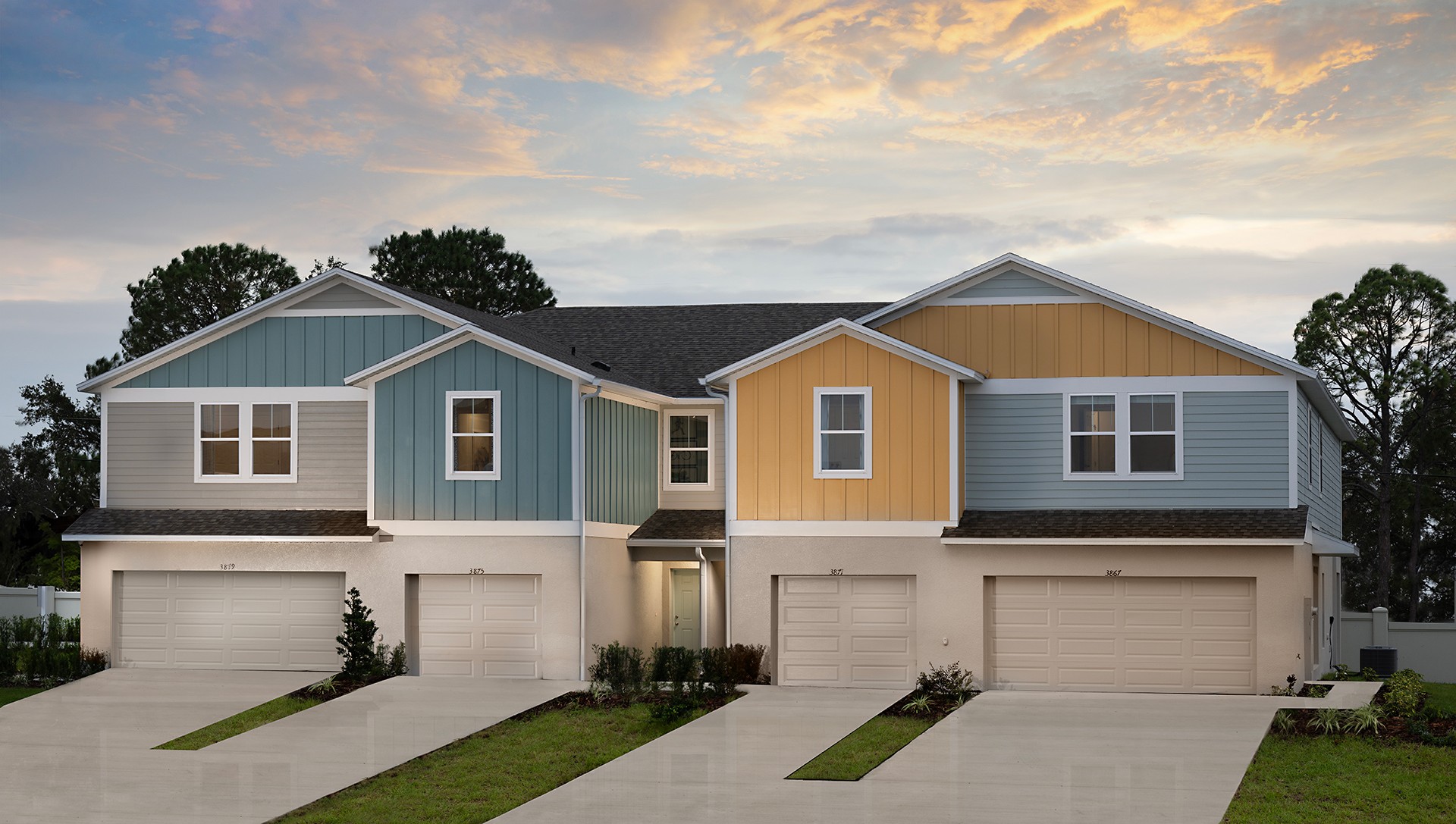 Vista del paisaje urbano que representa la vida en Haines City con aceras, jardines y viviendas residenciales.